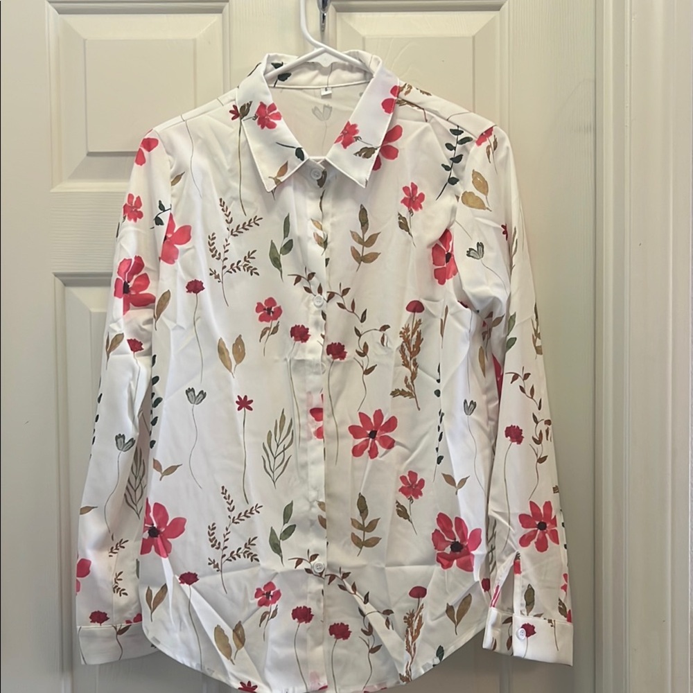 White with pink, florals, gold leaves. NWOT. Long sleeves.